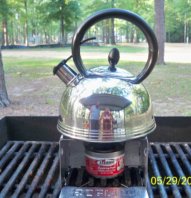 Kettle on Sterno on a grill